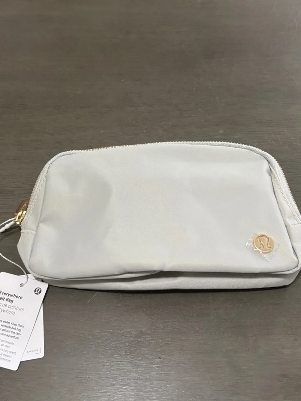 lululemon athletica Light Gray Cosmetic Pouch with Gold Logo